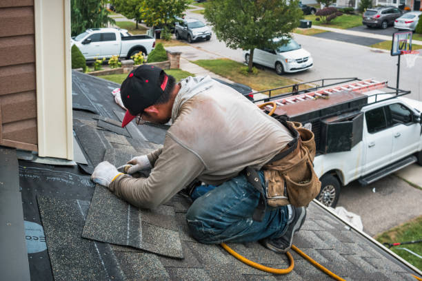 Professional Roofing technician working in Trumbauersville, PA